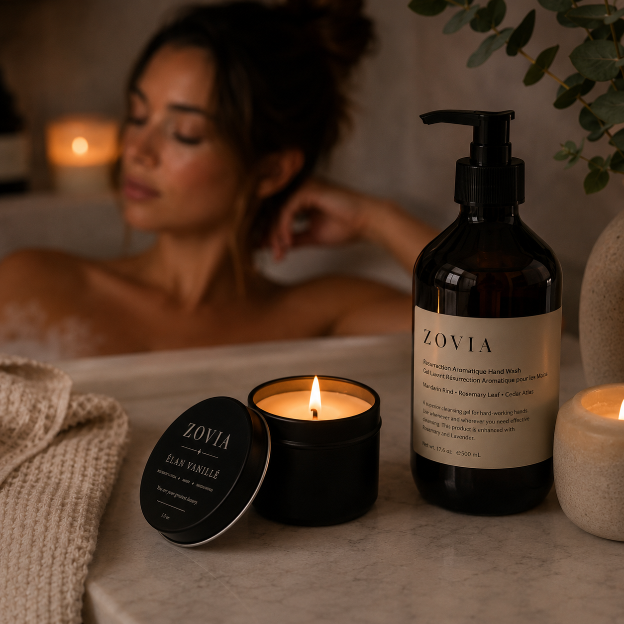 Woman relaxing in the bath with Elan Vanille 1.5oz candle
