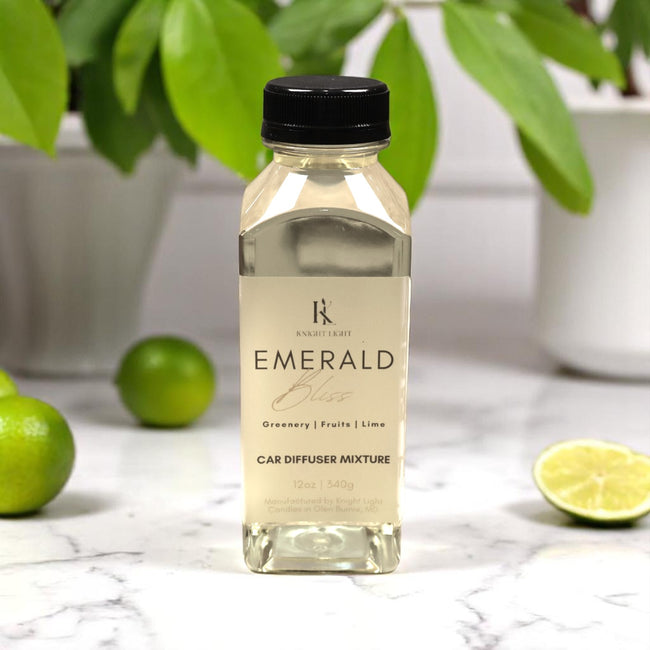 Emerald Bliss Car Diffuser Refill Bottle Lemon and Limes in Background